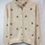 Cardigan flores bordadas frontal percha